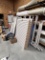 LOT: MOBILE SLAT WALL DISPLAYS,  ON FLOOR AND ON TOP OF SHAE CUTTING ROOM.