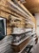 WINDOW SHADE ITEMS, TRAVERSE RODS ON SHELF,  UP ABOVE, AND ON PALLET RACKING