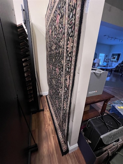 6' X 9' AREA RUG ON WALL