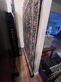 6' X 9' AREA RUG ON WALL