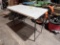 LIFETIME 4' DOUBLE FOLDING TABLE, ADJUSTABLE HEIGHT