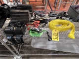 LOT OF ASSORTED RATCHET STRAPS, BUNGEES, TIRE CHOCKS