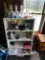 BOOKSHELF & CONTENTS: GLASSWARE, ALEXA SPEAKER, MISC. COLLECTIBLES, VHS TAPES