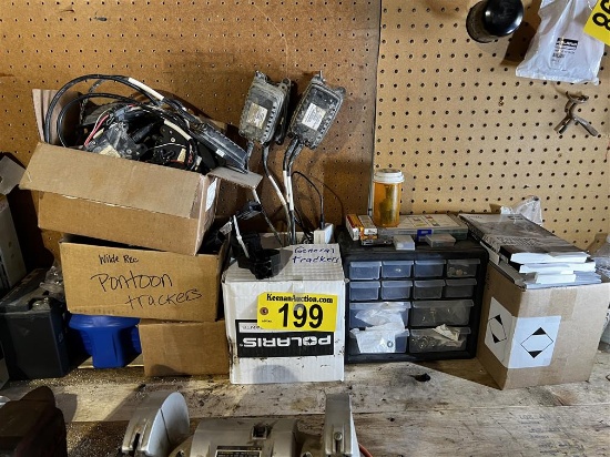 LOT: ASSORTED EQUIPMENT TRACKERS, POLARIS MANUALS, PARTS BIN & CONTENTS