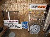CONTENTS ON BACK WALL: VINTAGE SIGNAGE, RETAIL SLANTED DISPLAY RACK, FLOOR FAN, MISC.