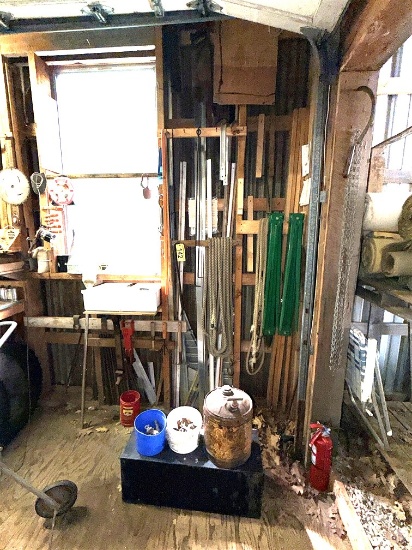 Contents On Wall: Saw Horses, Rope, Rebar, Crow Bars