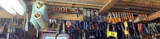 Lot Of Assorted Hand Tools Hanging From Rafters:
