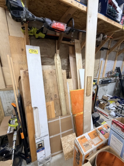 LOT ASSORTED LUMBER ON WALL, PLYWOOD, TRIM