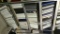Adjustable metal shelving unit w/particle board shelves