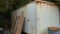 ENCLOSED METAL TRAILER WITH 3 ROLLING DUMPSTERS INSIDE