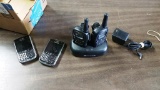 (2) MIDLAND RADIOS AND (2) BLACKBERRY PHONES
