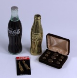 LOT OF COCA-COLA COLLECTIBLES - EARRINGS, RADIO, GOLD BOTTLE & BUTTONS
