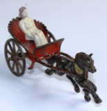 VINTAGE CAST IRON BUGGY / CARRIAGE WITH 1 HORSE AND LADY DRIVER