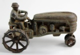 VINTAGE CAST IRON TRACTOR WITH DRIVER