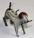 VINTAGE TIN WIND-UP DOG WITH SPINNING TAIL