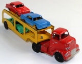 VINTAGE TOOTSIETOY CAR HAULER AND 3 CARS