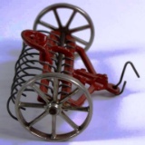 VINTAGE CAST IRON TRACTOR RAKE