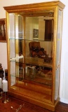 GOLD LIGHTED DISPLAY CABINET WITH GLASS SHELVES