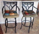 PAIR OF METAL ROTATING BARSTOOLS WITH UPHOLSTERED SEATS