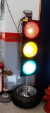 TRAFFIC LIGHT ON TIRE STAND - RED YELLOW GREEN