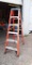 2 WERNER 6FT ORANGE FIBERGLASS LADDERS