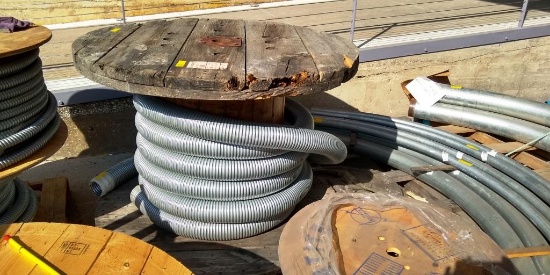 HUGE WOOD SPOOL OF FLEXIBLE METAL CONDUIT