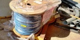 PALLET OF 2 WOOD SPOOLS OF BLUE AND YELLOW CONDUIT