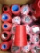 LOT OF CONES OF THREAD - RED, BLUE & MORE