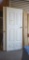LOT OF USED DOORS WITH KNOBS AND HARDWARE