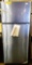 NEW GE STAINLESS STEEL REFRIGERATOR - DAMAGED IN SHIPPING