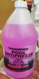 LOT OF 16 GALLONS OF CHAMPION POOL ANTI-FREEZE