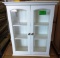 WHITE SHELF UNIT WITH GLASS DOORS