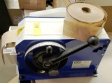 U-LINE H-725 TAPING MACHINE WITH EXTRA ROLL OF TAPE