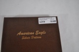 Book of 23pc. American Eagle Silver Dollars