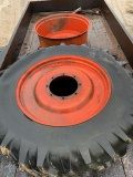 Dual Rims off a Case tractor, 1 has a tire