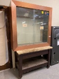 Glass Gun Display Case Sitting on Table