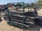 Rack with Asst. Tin & Approx 22 round fence posts