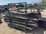 Rack with Asst. Tin & Approx 22 round fence posts