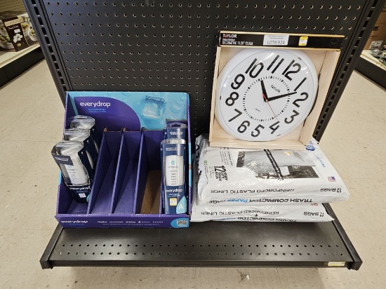 Shelf Lot of New Filters, Clock and Compactor Bags