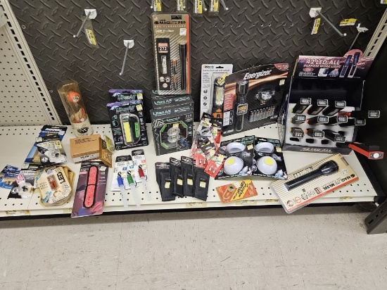 Shelf Lot of NEW Assorted Flashlights/ Accessories