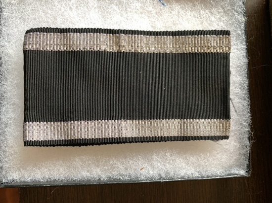 Grey/White ribbon for medal