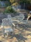 Rectangle glass top metal patio table, off white with four patio chairs