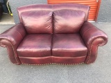 Leather love seat