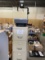 Four drawer filing cabinet and overhead projector