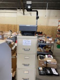 Four drawer filing cabinet and overhead projector