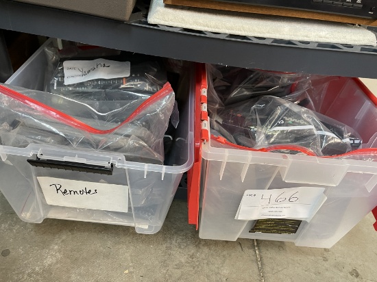Two Plastic Storage Containers Of Miscellaneous Remotes,