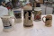 Five steins of various origins and sizes, ceramic
