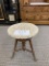 Antique piano stool, wood with tapestry seat, three legs