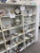 Two White pressboard shelf units only (items not included)