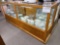 Large wood and glass display case, mirrored back, lights, locks